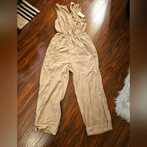 Brand New Scoop Neck Jumpsuit. Size M